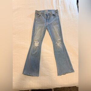 MOTHER The Weekender Light Blue Distressed Flare Jeans